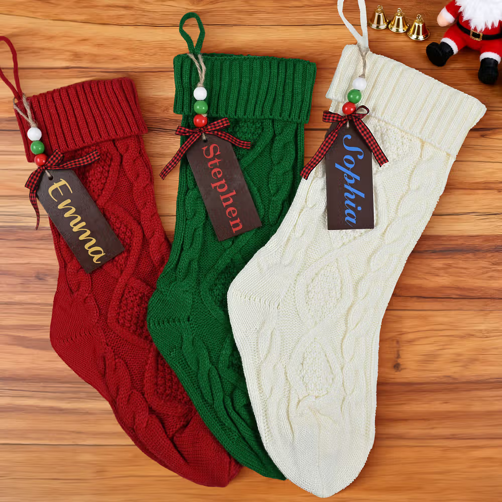 Wooden stocking name tags on red, white, green stockings
