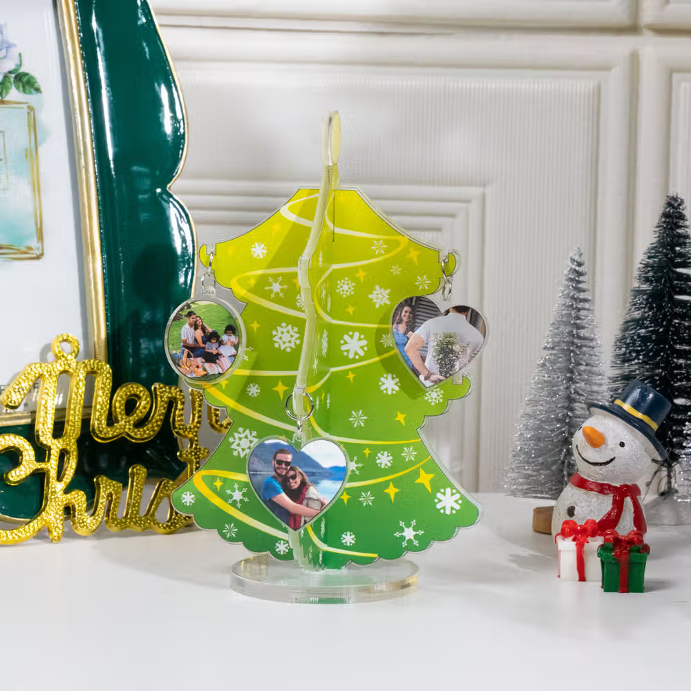 Three photo-charm Christmas tree decorations